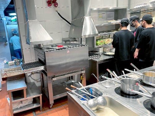 Conveyor Roast Fish Oven at work