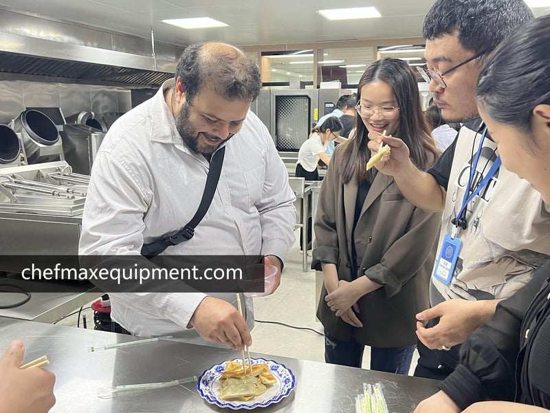 Chefmax tasting fried dumplings with customers